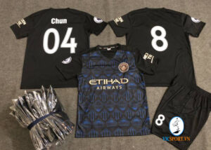 ÁO MAN CITY XANH ĐEN IN CHO KHÁCH