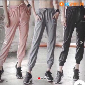 Quần dù jogger nữ sọc hông